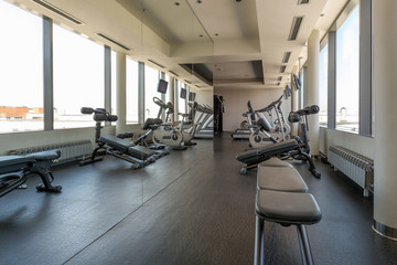 Fototapeta na wymiar Interior of a gym with equipment
