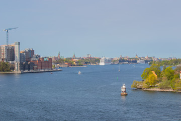 Southern Stockholm seen from the fjord in southwestern direction. The cruise ships are docked at Stadsgarden harbour.