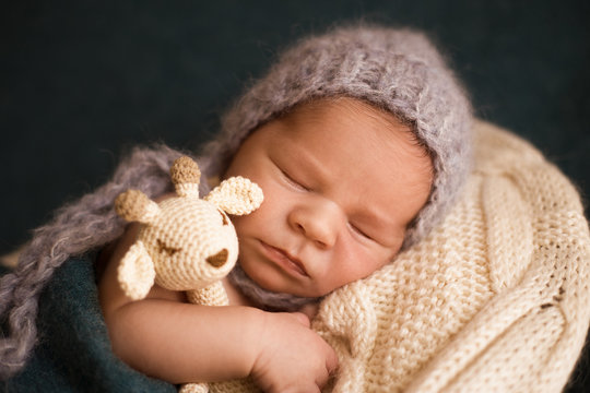 Sleeping newborn boy
