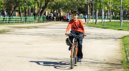 Boy with his bicycle