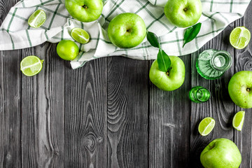fitness food with green apples on dark background top view mockup