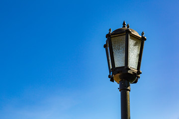 Fototapeta na wymiar Vintage old lantern on a city street