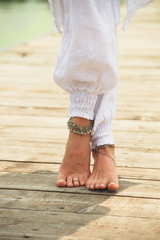 barefoot woman legs  boho summer fashion