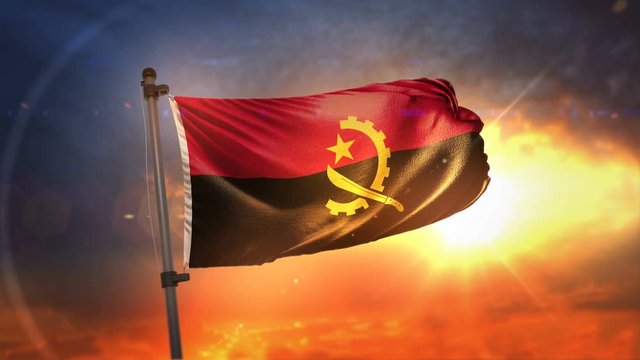 Angola Flag Backlit At Beautiful Sunrise Loop Slow Motion 4K