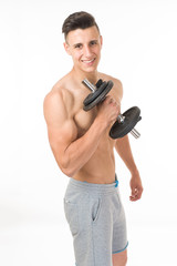 Fototapeta na wymiar Muscular young sportsman exercising on white background