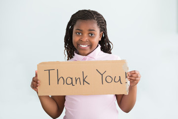 Girl Holding Thank You Sign