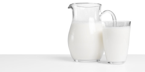 Pitcher  with some milk