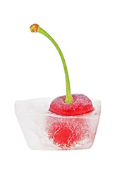 Cherry in ice cube over white background