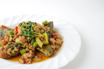 stir fired minced pork with basil top on fired preserved egg.