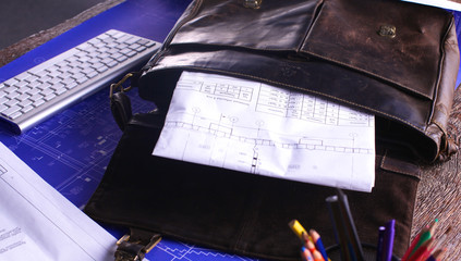 Obraz premium Close up man working of Architect sketching a construction project on his plane project at site construction work