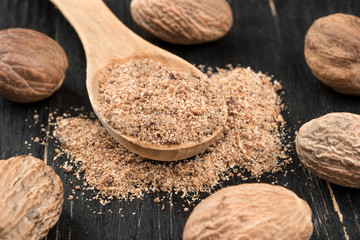 Nutmeg powder in spoon