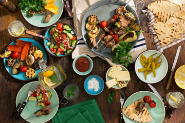 Different food cooking on the grill, top view