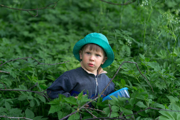 Sad, upset boy in the forest dark more often.
