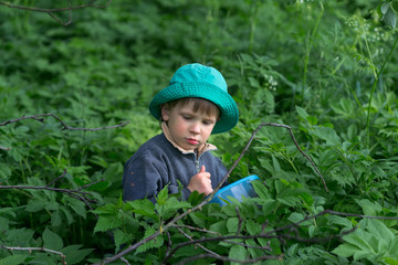 Sad, upset boy in the forest dark more often.