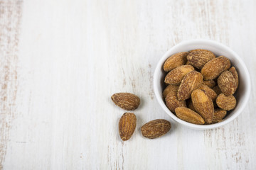 Almond on a  wooden table