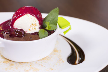 Beautiful dessert at the restaurant. Petit gateau dessert. Hot chocolate pudding with vanilla ice cream ball.