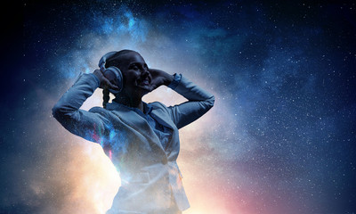 Woman wearing white headphones. Mixed media