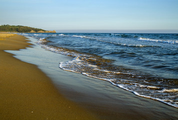 Beautiful landscape of sandy beach  on the Mediterranean Sea coastline  before sunset. Italy.