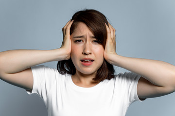 young woman having a headache.