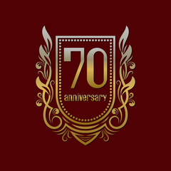 Seventieth anniversary vintage logo symbol. Golden emblem with numbers on shield in wreath.