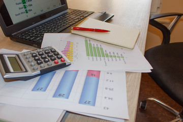 Graphs, charts, business table. The workplace of business people