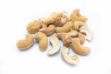 Roasted salted cashews, isolated on a white background