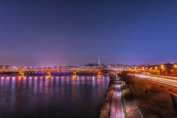 Fototapeta na wymiar landscape of Hangung River in the evening and Seoul Tower in the night in Seoul, Korea