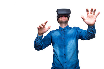 Man wearing virtual reality goggles. Studio shot, white background