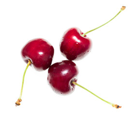 Juicy red cherry on a white background