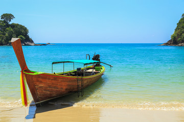 Fototapeta na wymiar Tropical beach, traditional long tail boats, Andaman Sea, Thailand