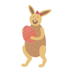 Brown bunny holding Easter egg