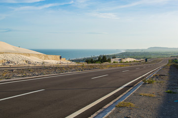 National Road with white sand dune in Mui Ne