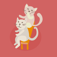 Couple of cats sitting on bench