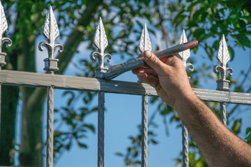 Painting the door in the garden