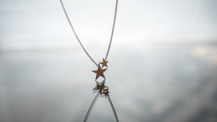 Jewelry product shot. Showcase for precious metal accessories