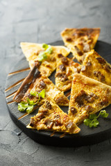 Pie with curry sauce and baked pork