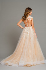 Fototapeta premium beautiful young bride in white wedding dress