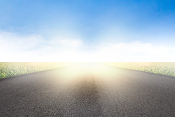 Start road on field a background of the blue sky