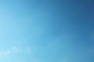 Fototapeta premium clouds in the blue sky. Beautiful Blue Sky Background Template With Some Space for Input Text Message Below Isolated on Blue