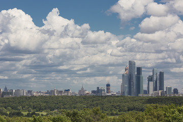Fototapeta na wymiar Cloudy sky over Moscow. Aerial view of Moscow-City.
