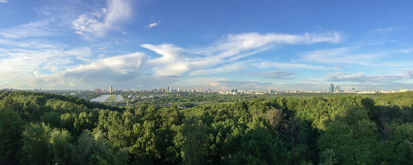 Panoramic view of Moscow from Krylatskoye District. Sunset time.