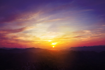 Obraz premium Colorful sunset on top of thailand mountain