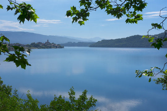 Village reflected in the water of Lake Ullibarri-Gamboa, Euskadi