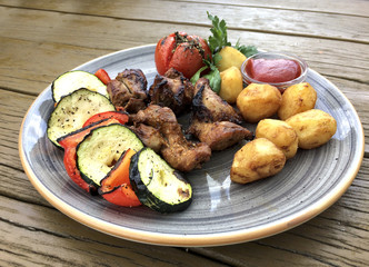Traditional maltese food - rabbit with fresh vegetables. Malta. Fenek.