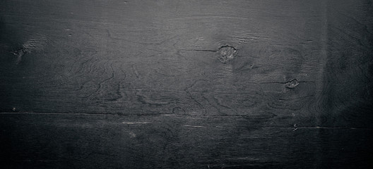 Wooden structural black background. Top view. Free space.