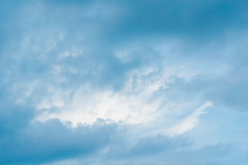 Blue sky background with tiny clouds. White fluffy clouds in the blue sky