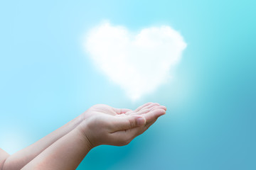 Hand holding cloud  with cloud heart concept