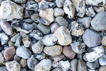 Pebble stones, background. Beach on the Rugen Island.