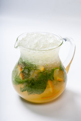 Homemade lemonade in a glass jug. Refreshing drink. A refreshing drink