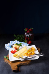 Asparagus , hollandaise sauce and baked potatoes